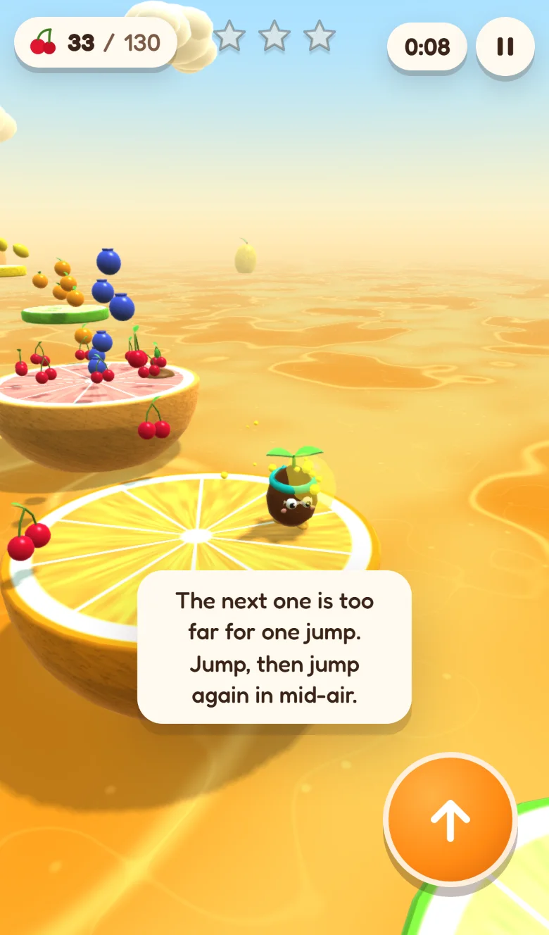 An iPhone 13 viewport: Pip faces the camera on half an orange, the grapefruit half and its cherries behind him. Across the top are the counter at 33 of 130, three empty stars, the clock and pause. A hint reads The next one is too far for one jump. Jump, then jump again in mid-air, and a large orange jump button sits under the right thumb.